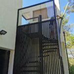 Escalier colimaçon avec claustra aluminium, Montferrier sur Lez, Hérault 34, villa architecte